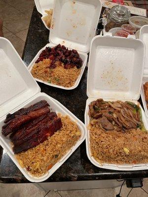 Pork fried rice and BBQ Ribs, pork fried rice and spare ribs, pork friend rice and Mongolian beef.