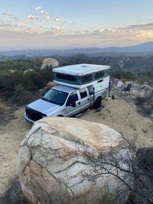 Camper with camper mounts installed by broken wheel rv