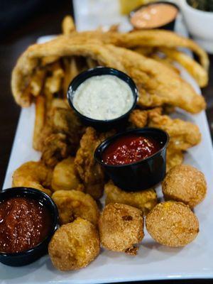 Seafood platter (hush puppies, shrimp, whiting, and oysters)