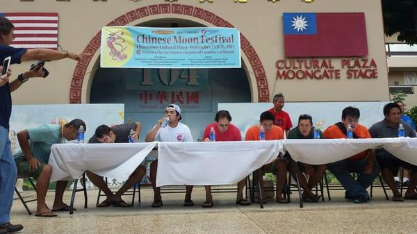 Men's moon cake eating contest.