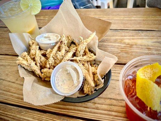 Fried crab claws, margarita and old fashioned