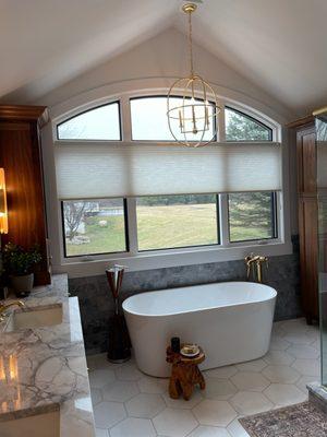 Hunter Douglas Duette in Elan-Journal softens the light and adds privacy in this customer's bathroom window.