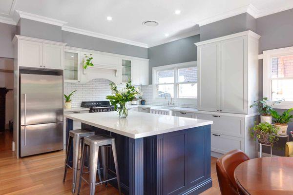 These stunning blue and white shaker cabinets are the perfect addition to any kitchen!