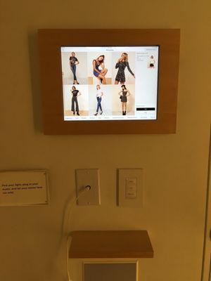 You can order clothes to be brought to your dressing room via this cool touch screen.