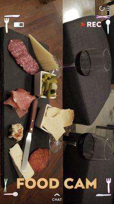 Charcuterie board and wine