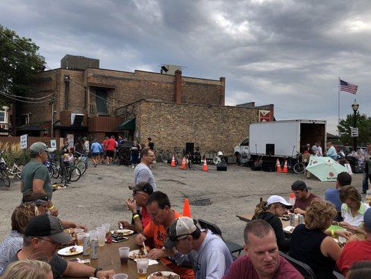 Outside the bar parking lot during bike event.