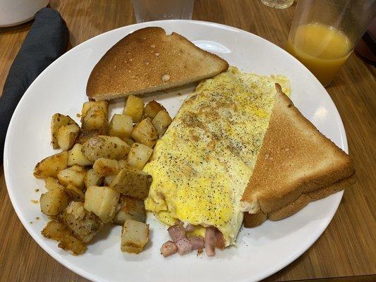 Omelet with home fries and gluten-free toast