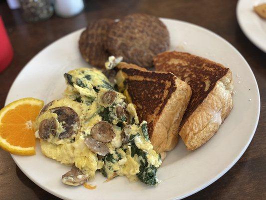 Stuffed French toast, impossible sausage, and scrambled egg with mushrooms, spinach, and feta