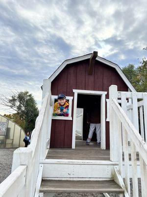 My son in the barn playground