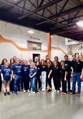 Helping our friends from NTT Data volunteer at the North Texas Food Bank