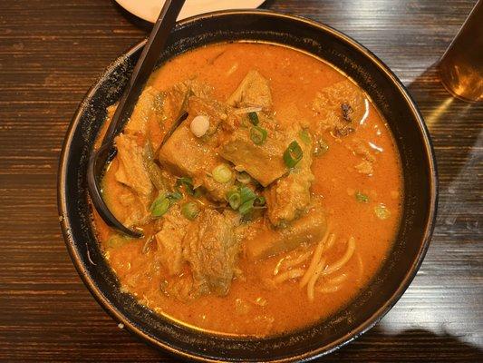 Curry beef brisket noodle soup with egg noodles