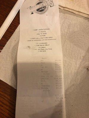 The price of two burgers with fries and a drink.