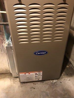 They replaced my old furnace with this Carrier on a Saturday morning.