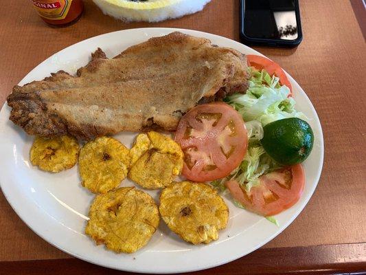 Where is steak with salad and plantains