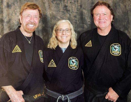 Owner/Chief Instructor Lindy Woods 7th Degree Black Belt with Chuck & Aaron Norris 2021