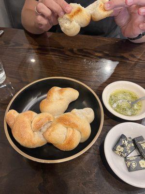 Complimentary bread with a pesto sauce