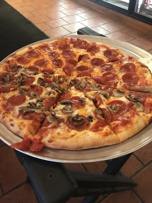 Pepperoni with mushrooms on half