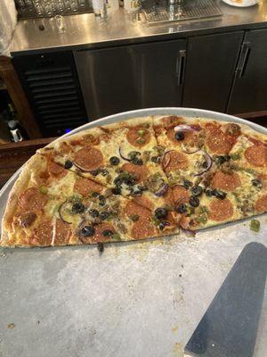 House special pizza, with pepperoni, sausage, olives and onions.