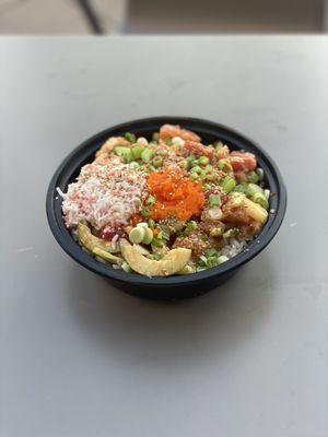 Regular Bowl with salmon, ahi tuna, and shrimp. Toppings are cucumber, green onion, masago, soy sauce, and spicy mustard.