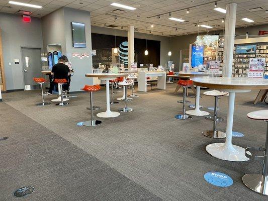 Inside: Very well-spaced customer tables with shields up on each tabletop