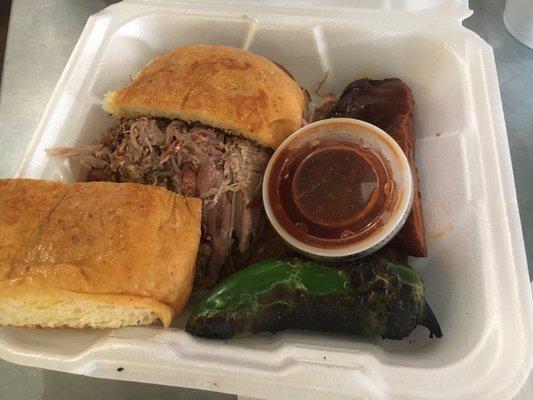 Bubba's Blowout $20 chopped brisket, pull pork n' saus ,1 rib, grilled jalap, on a jalap. ched. sourdough bun, bbq sauce