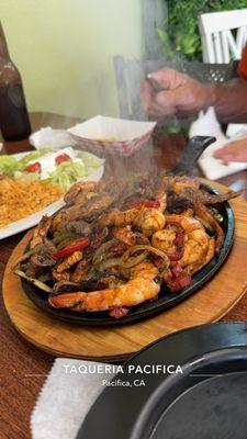 Three meat fajitas.    Enough for two people.