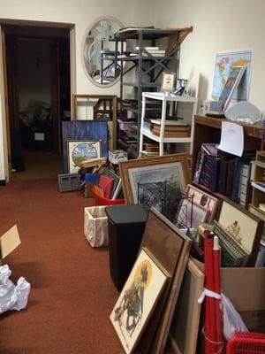 We have a very large collection of frames and photos. Just come in and ask.