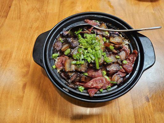 Stone pot rice with Chinese sausage and Chinese bacon.