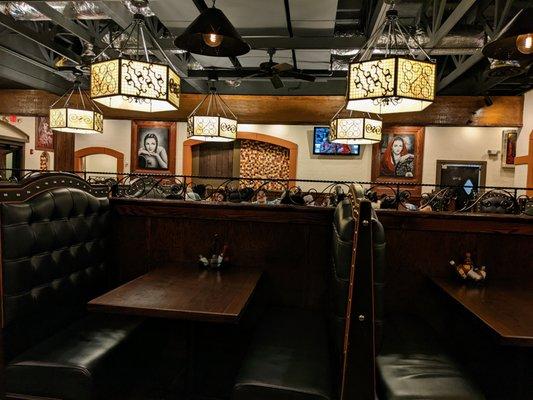 Inside. Dining room. Booths at front of house. Large group tables in middle/back of house.