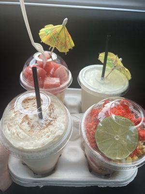 Isla, limonada de coco, coquito frappe, and esquites