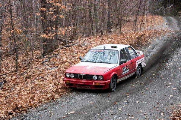 Your contact on the phone Dan Getting it in his e30 Rallycar