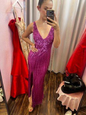 Trying on fun gowns in the shop