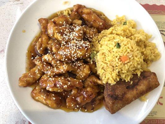 Lunch Sesame Chicken with fried rice, egg roll.