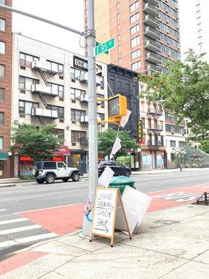 Here's the Grand Opening sign on the corner 95th and Second Avenue. 05/28/22