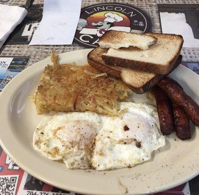 Two eggs over easy, Hashbrowns, sausage links