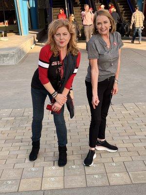 Marian and JoAnn at 9er game in front of Dad's brick after OSCAR LOPEZ fix my Q3 Audi