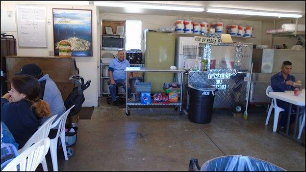 As you enter the restaurant, you'll meet the friendly owner of the business, Ernesto, as he relaxes behind the counter.