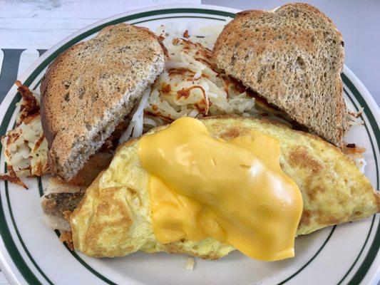 Lake Perch and Cheese Omelette with Has Browns