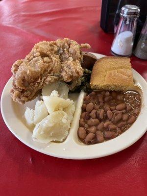 Fried chicken, potatoes, pinto beans, cornbread, sausage