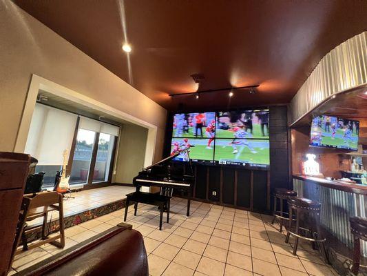 Stage live music area and large screen tv for sports