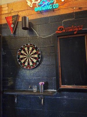 Love that there is a dartboard.