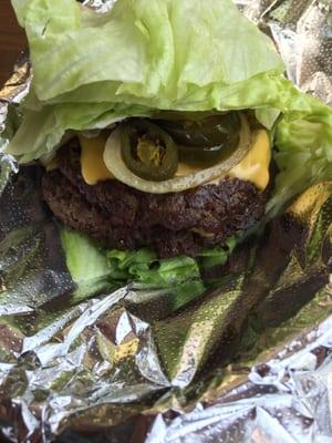 Bacon Cheeseburger wrapped in lettuce with grilled onions, grilled jalapeños, pickles, and mayo. So good!!!