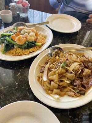 Seafood Cantonese crispy noodle and wok fried Fat Noodle with Beef.