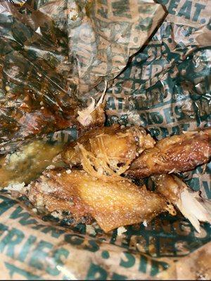 NASTY WINGS WITH FEATHERS STILL ON THEM FRIED UNBELIEVABLE YUCK!!!!!