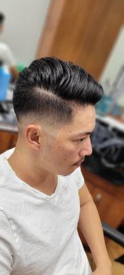 Mid bald fade with comb over