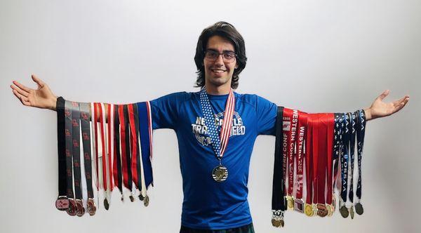 A picture of our Spanish Son Inigo after winning multiple medals in Track during his year in America