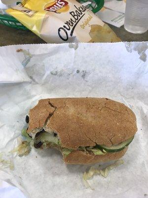 Veggie sub with provolone, lettuce, cucumber, black olive and honey mustard.