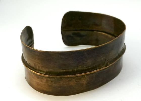 Hammered bronze cuff bracelet by MollyMoo Creations.