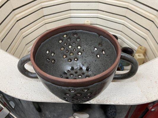 Steel grey on red clay,   Handled berry bowl