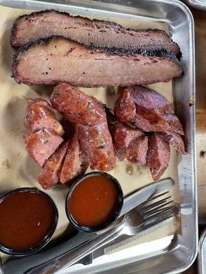 Brisket, Jalapeño cheese sausage and plain sausage. Sauce on the side, as it should be.